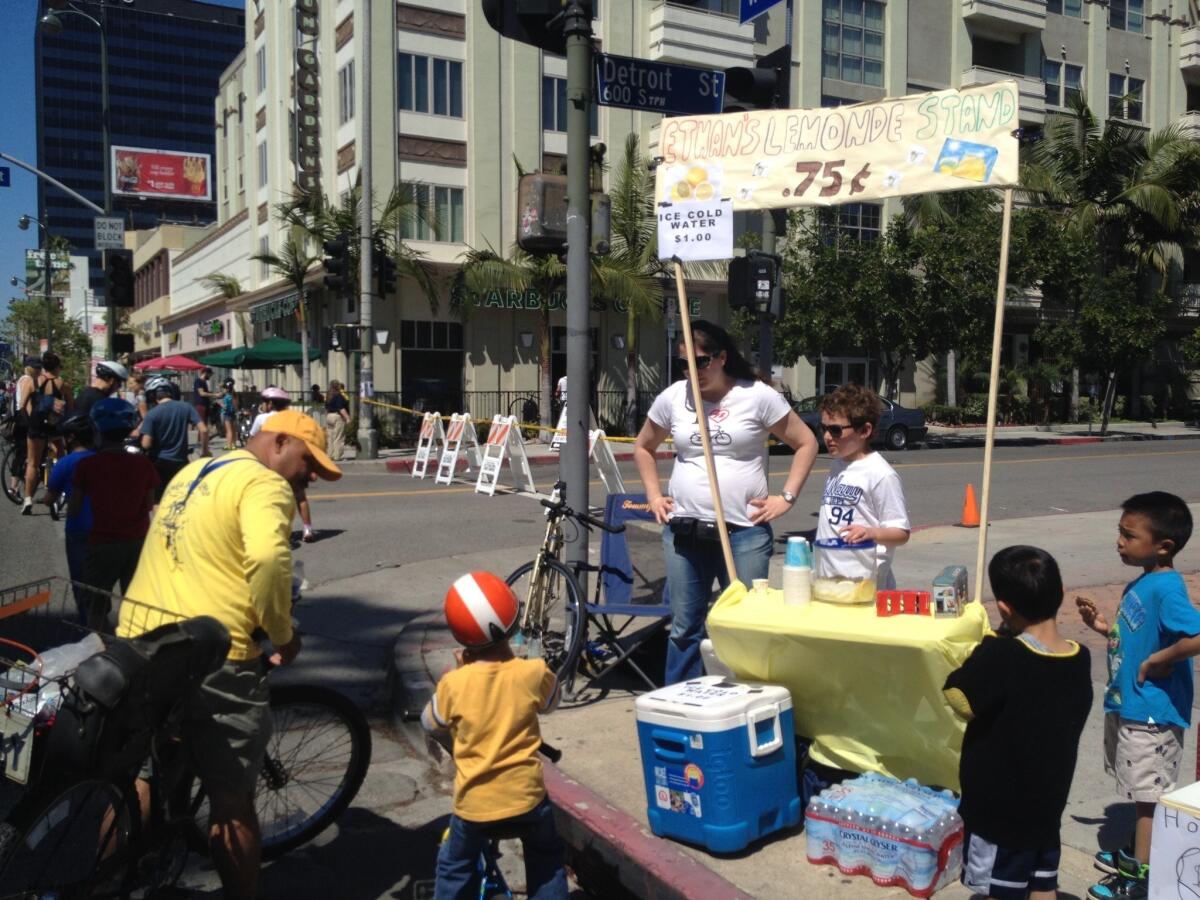 Ethan Gibbel, 7, and friends turn lemonade into cash at CicLAvia event.