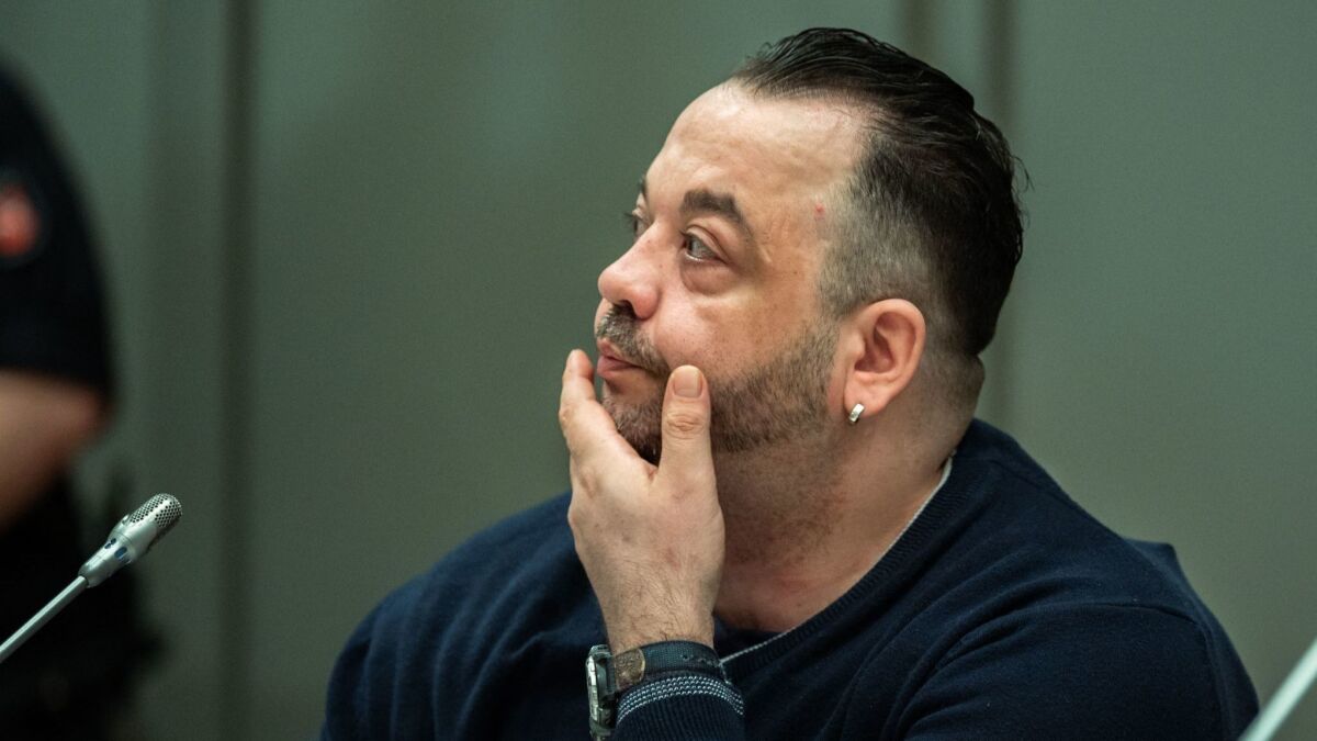 Former nurse Niels Hoegel waits for the start of a session of his trial in Oldenburg, northern Germany, on June 5.