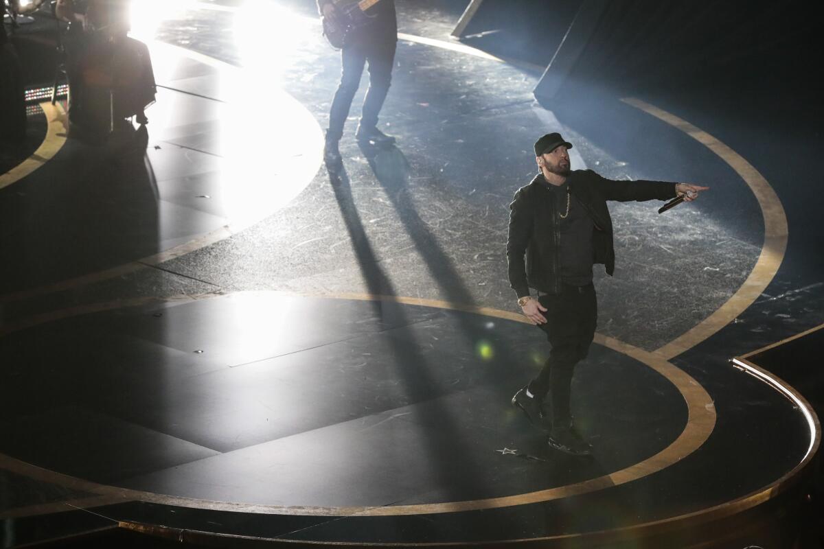Eminem performs on stage during the telecast of the 92nd Academy Awards on Sunday.