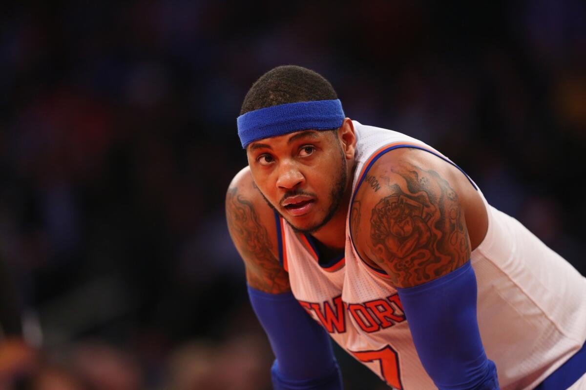 Carmelo Anthony of the New York Knicks looks on against the Detroit Pistons during their game at Madison Square Garden on Jan 7.