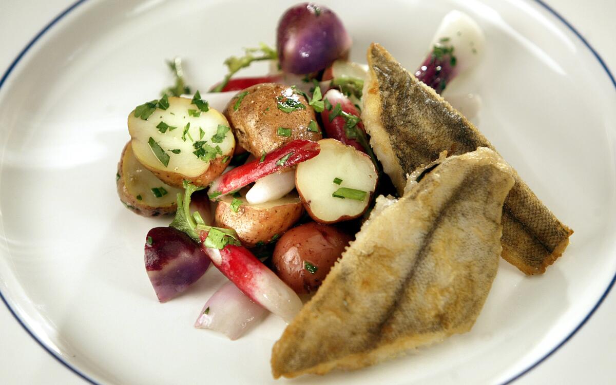 Sauteed rex sole with spring vegetable salad in bacon vinaigrette