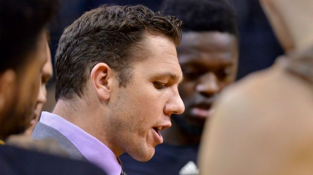 Lakers Coach Luke Walton talks with his players during the first half of a game against the Grizzlies on Dec. 3.