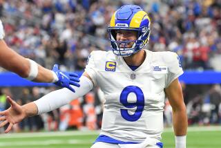 Inglewood, CA. September 26, 2021: Rams quarterback Matthew Stafford celebrates his touchdown pass.