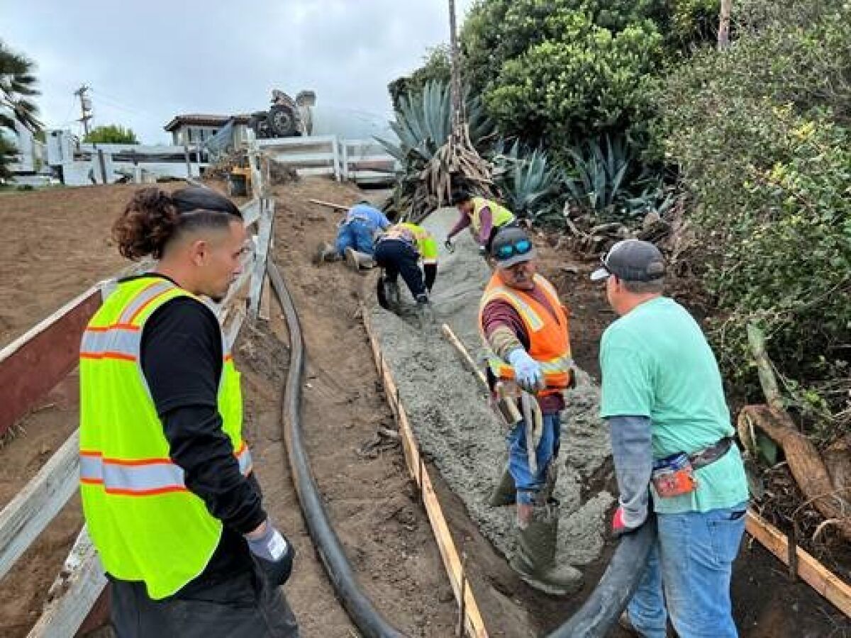 San Diego city crews work on repairs to a storm drain at La Jolla Hermosa Park in Bird Rock.