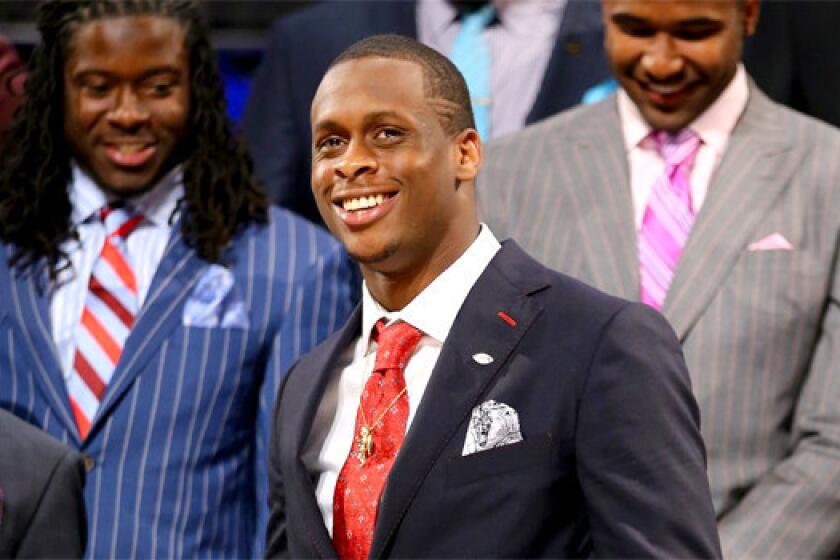 West Virginia quarterback Geno Smith was expected to be chosen in the first round of the 2013 NFL Draft, but at the end of the night he was still waiting for his call in the green room.