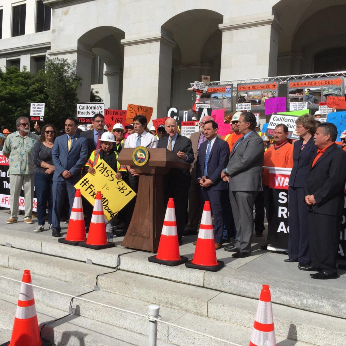 Gov. Jerry Brown and legislative leaders gathered outside the Capitol in Sacramento to make a last public appeal for support on the eve of a possible vote on a gas tax increase to repair roads.