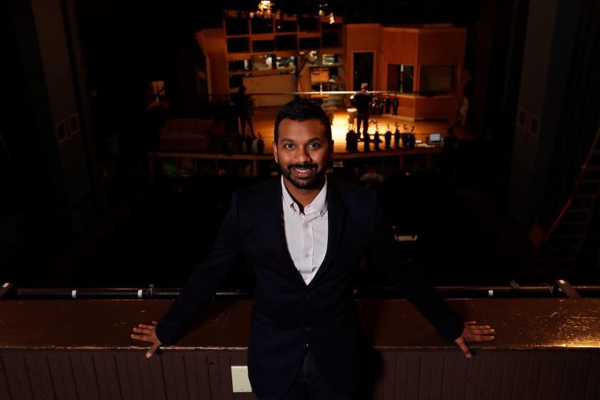 LOS ANGELES, CA-OCTOBER 9, 2017: Snehal Desai, the artistic director at East West Players, the Asian American theater based in Little Tokyo, is photographed on the balcony level of the playhouse, with the stage seen in the background on October 9, 2017. (Mel Melcon/Los Angeles Times)
