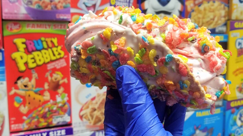The LeBron James Taco features a waffle cone (in the shape of a taco) with Fruity Pebbles-infused ice cream and then topped with more of the cereal. James created custom Nike sneakers in the same cereal pattern.