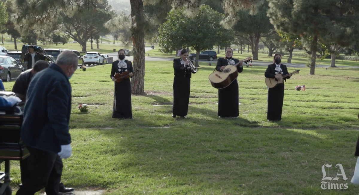 Mariachi Linda Mexicanas perform at a funeral.