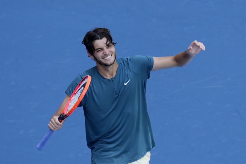 Taylor Fritz celebrates his win over Holger Rune of Denmark during the fourth round of the Miami Open tennis tournament, Tuesday, March 28, 2023, in Miami Gardens, Fla. (AP Photo/Rebecca Blackwell)