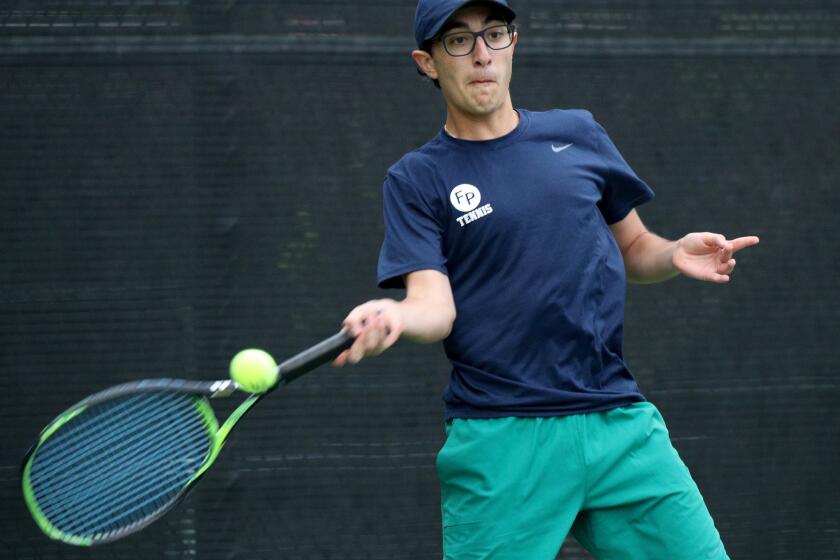 Flintridge Prep singles tennis player Andrew Megerdichian returns the ball in match vs. Maranatha High in the CIF Southern Section 2019 Boys Team Tennis Championships, division 4, at The Claremont Club in Claremont on Friday, May 10, 2019.