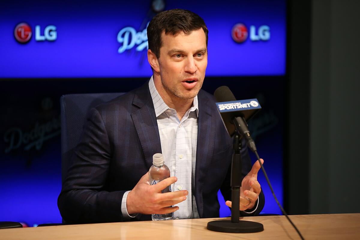 Dodgers President of Baseball Operations Andrew Friedman speaks at a news conference.