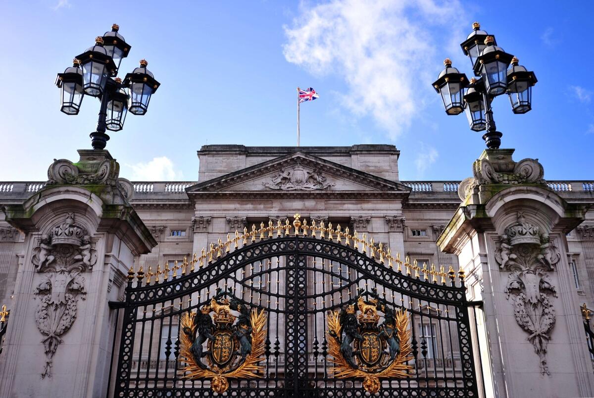 British lawmakers are questioning Queen Elizabeth II's budgeting, saying, for example, that Buckingham Palace, above, needs extensive repairs but that there's no money for such projects.