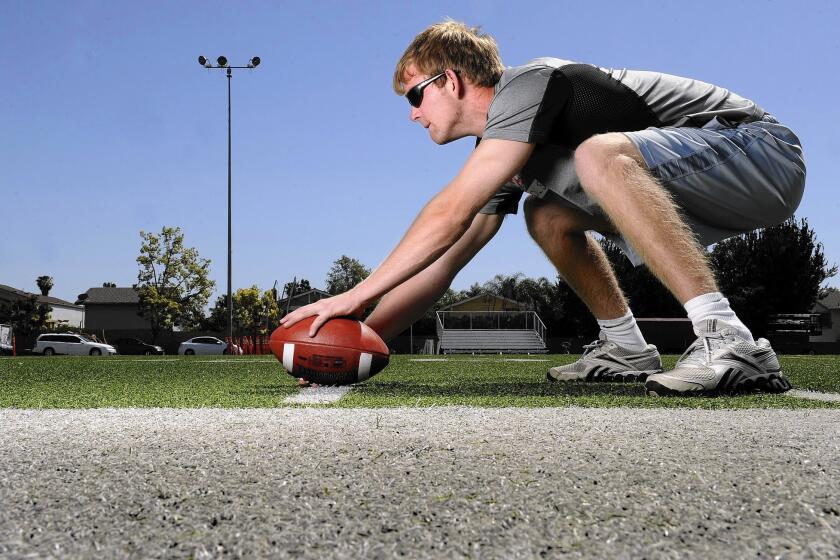 “Someday, he’s going to snap in a game for us,” USC Coach Steve Sarkisian said of blind athlete Jake Olson. “When? I don’t know. But it will happen."
