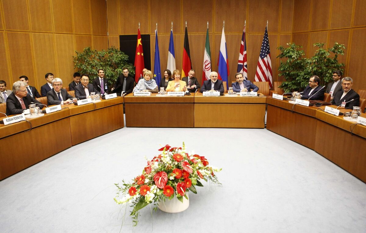 Negotiators from six world powers and Iran, shown here on March 18, have begun a final round of nuclear talks in Vienna.