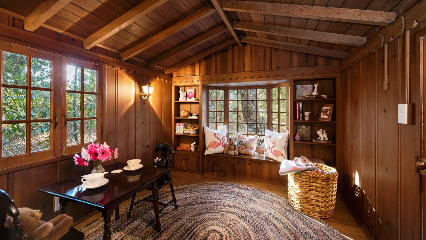 Cabin interiorwith windows and furniture