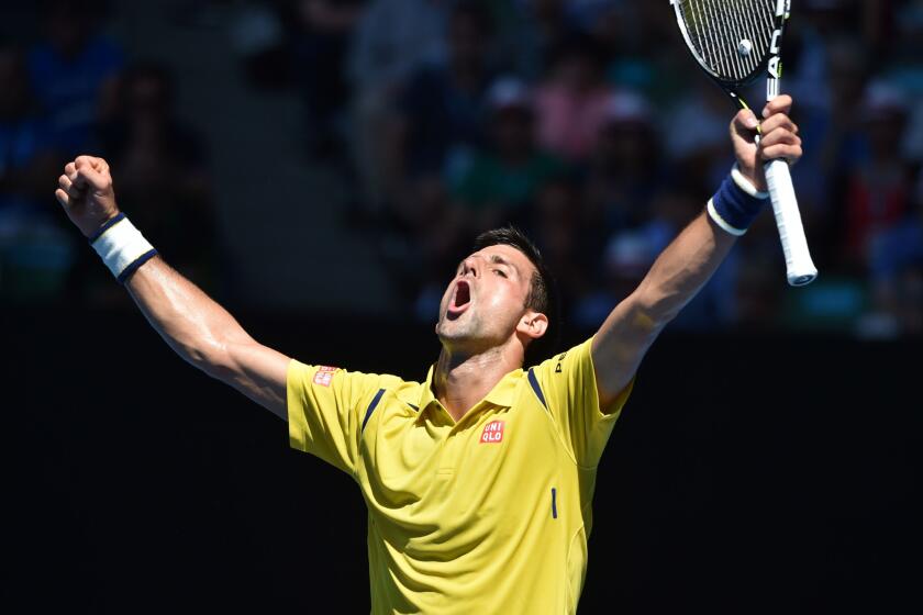 Novak Djokovic of Serbia reacts during his five-set victory over Gilles Simon of France, 6-3, 6-7 (1), 6-4, 4-6, 6-3, at the Australian Open on Jan. 24.