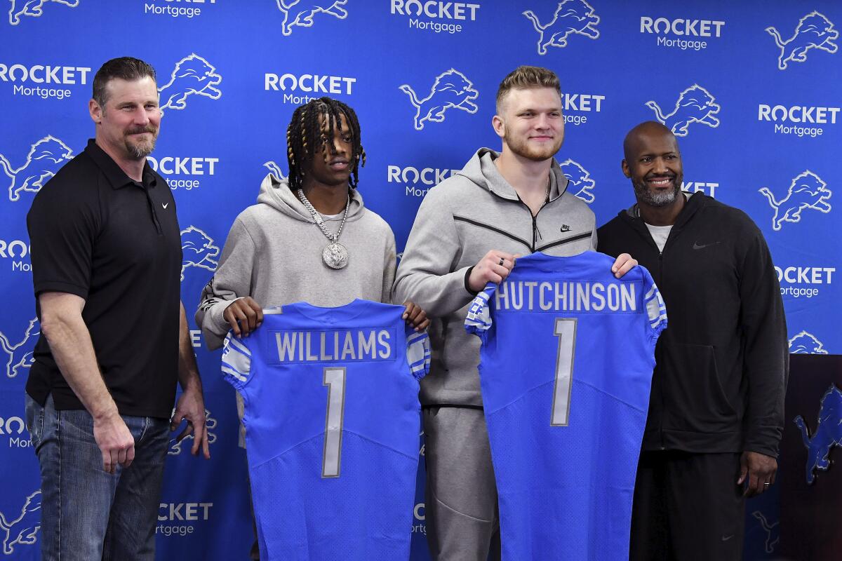 Lions sign DE Aidan Hutchinson to $35.7 million, 4-year deal - The San  Diego Union-Tribune