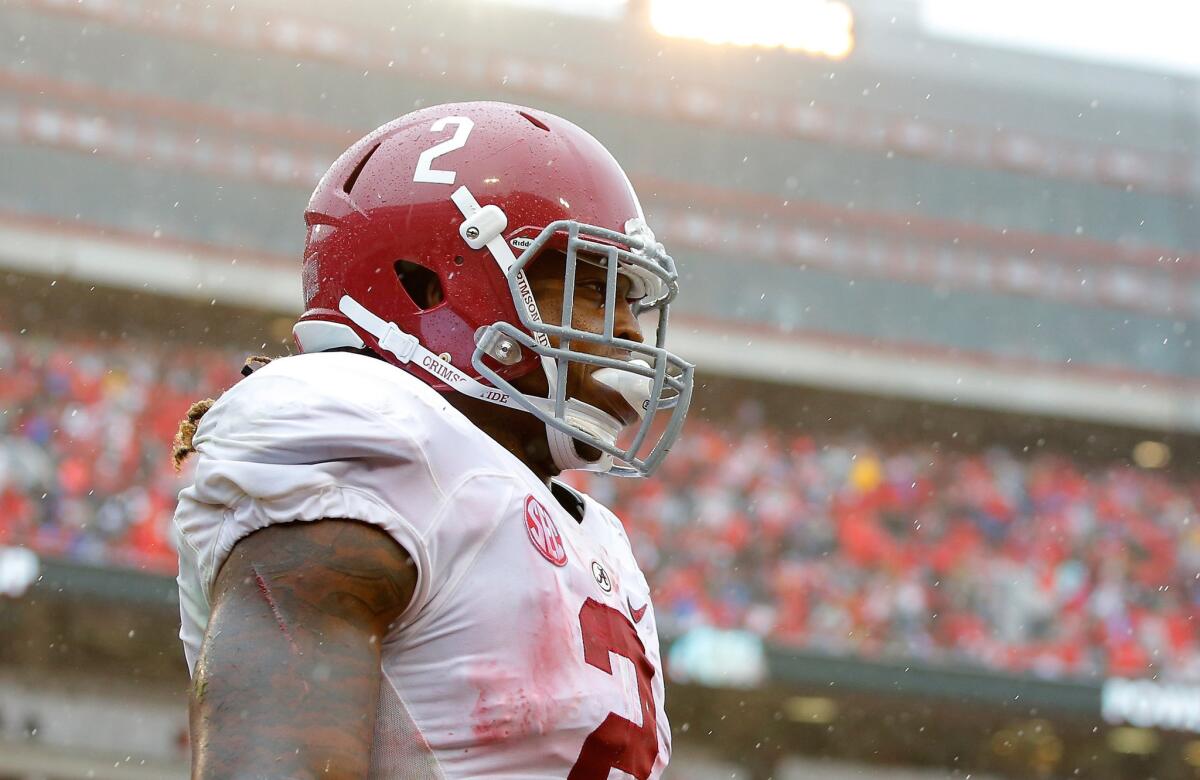 Alabama running back Derrick Henry reacts after rushing for a touchdown against the Georgia Bulldogs at Sanford Stadium on Oct. 3.