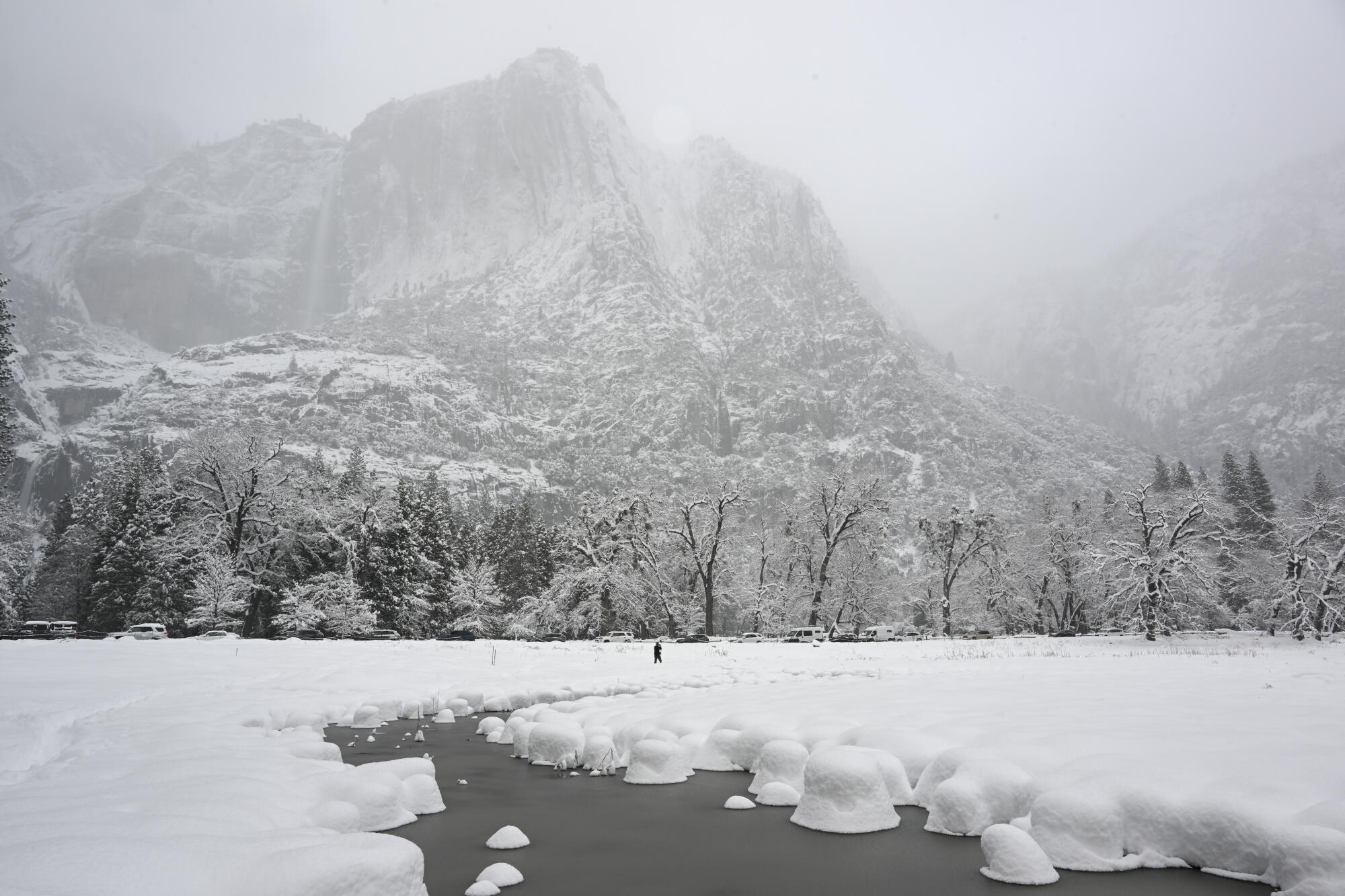 Large amounts of snow blanket the valley floor inside Yosemite National Park.