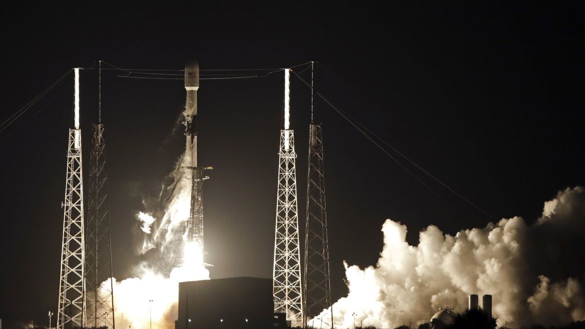 A SpaceX Falcon 9 rocket carrying 60 satellites for the company's Starlink broadband network blasts off on May 23, 2019, from Cape Canaveral, Fla.