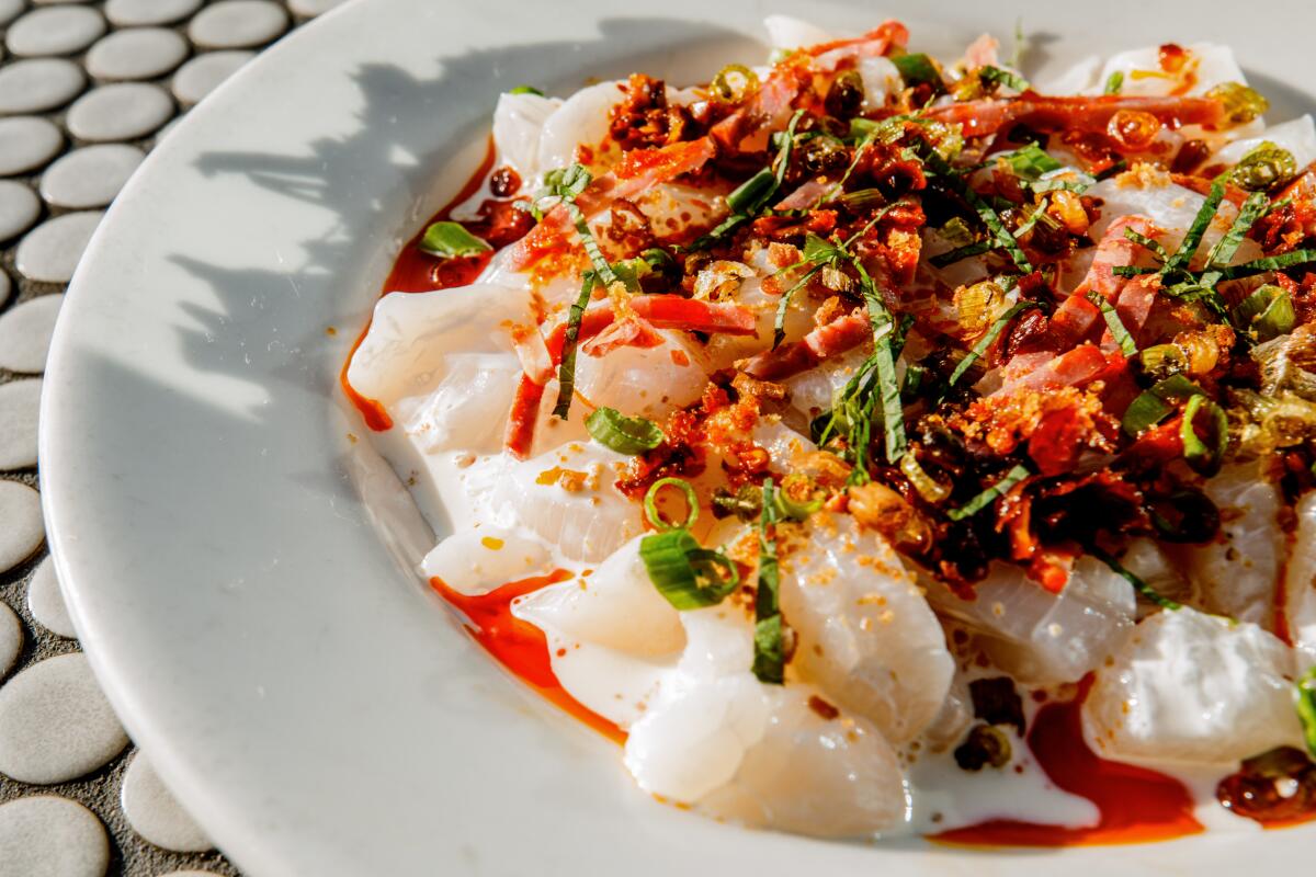 SANTA MONICA, CA - OCTOBER 4: Raw spicy scallops from Cassia.