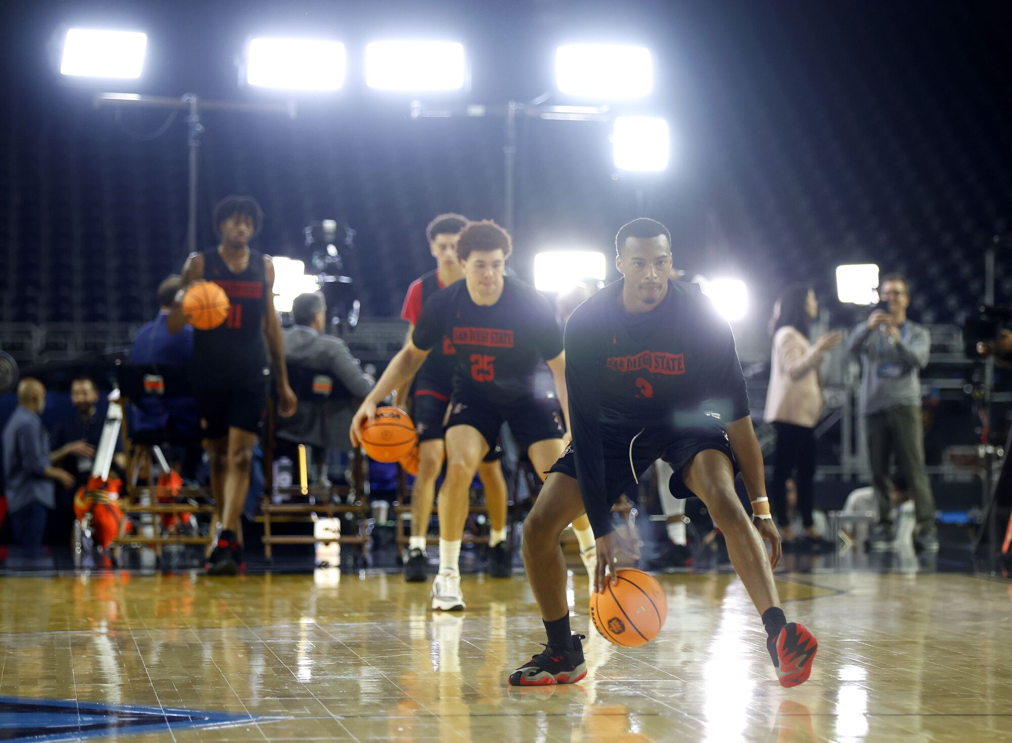San Diego State's Micah Parrish dribbles during a practice for a Final Four game.
