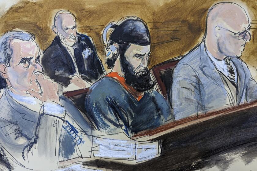 In this courtroom sketch, in federal court in New York, Wednesday, May 17, 2023, Sayfullo Saipov, center, is flanked by his attorneys, David M. Stern, left, and federal Defender Andrew John Dalack, right, during victim impact statements in the sentencing phase of his trial. Saipov, an Islamic extremist who killed eight in a New York bike path attack, was convicted of federal crimes, Jan. 26 2023. (AP Photo/Elizabeth Williams)