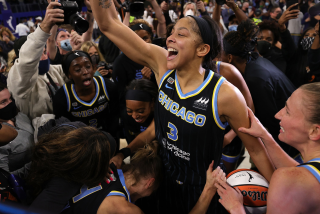 CHICAGO, ILLINOIS - OCTOBER 17: Candace Parker #3 of the Chicago Sky celebrates.