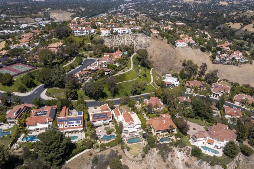 Calabasas, CA - May 13: Aerial views of homes around Calabasas Country Club Friday, May 13, 2022 in Calabasas, CA. (Brian van der Brug / Los Angeles Times)