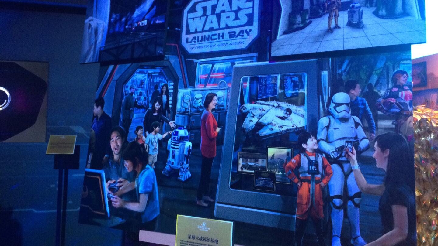 Displays showing the new Shanghai Disney attractions during a presentation at the Shanghai Expo Centre include artist renderings of the "Star Wars" attraction.