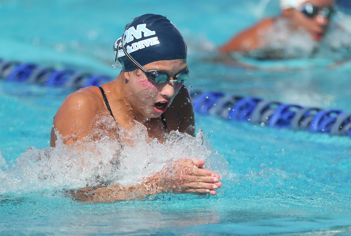 Sofia Szymanowski of Corona del Mar swims the girls' 200 individual medley in Tuesday's Battle of the Bay swim meet.