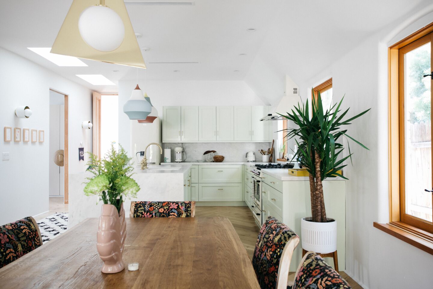 A dining area sits across from the kitchen.