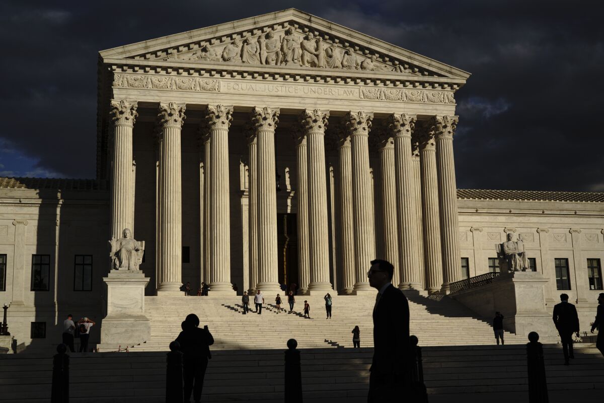 FILE - The Supreme Court is seen at dusk Oct. 22, 2021, in Washington. (AP Photo/J. Scott Applewhite, File)