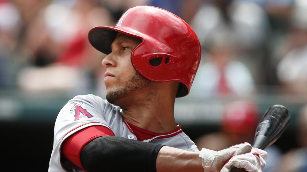 Andrelton Simmons bats against the Texas Rangers on Aug. 19.