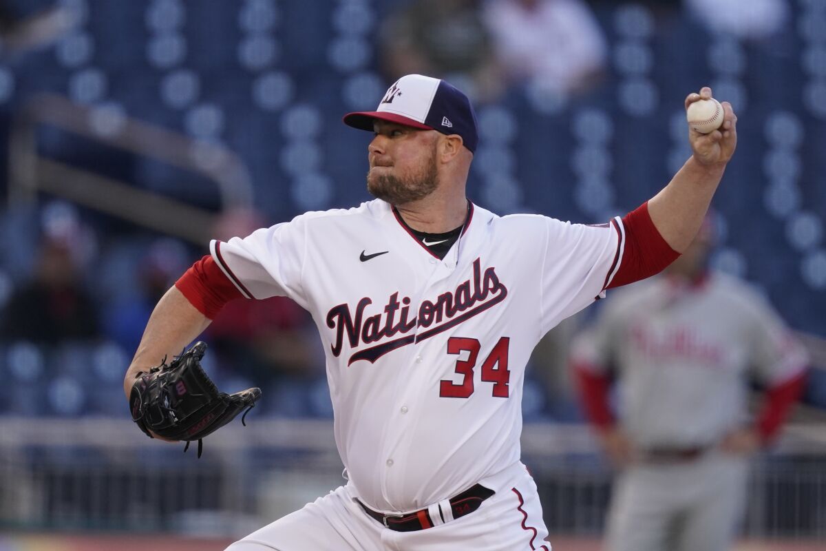 Washington Nationals starting pitcher Jon Lester throws during the first inning of the team's baseball game against the Philadelphia Phillies at Nationals Park, Wednesday, May 12, 2021, in Washington. (AP Photo/Alex Brandon)