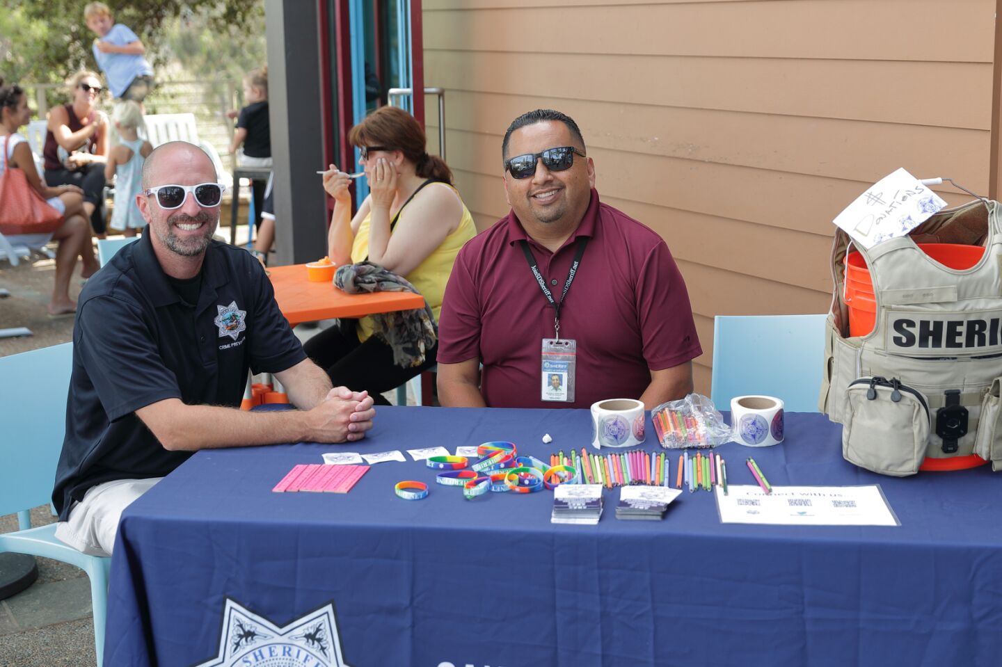 Crime Prevention Specialists Jonathan Simon and George Hernandez welcomed customers to the Cali Ice Cream Scoops for a Cause benefit for the Boys & Girls Club
