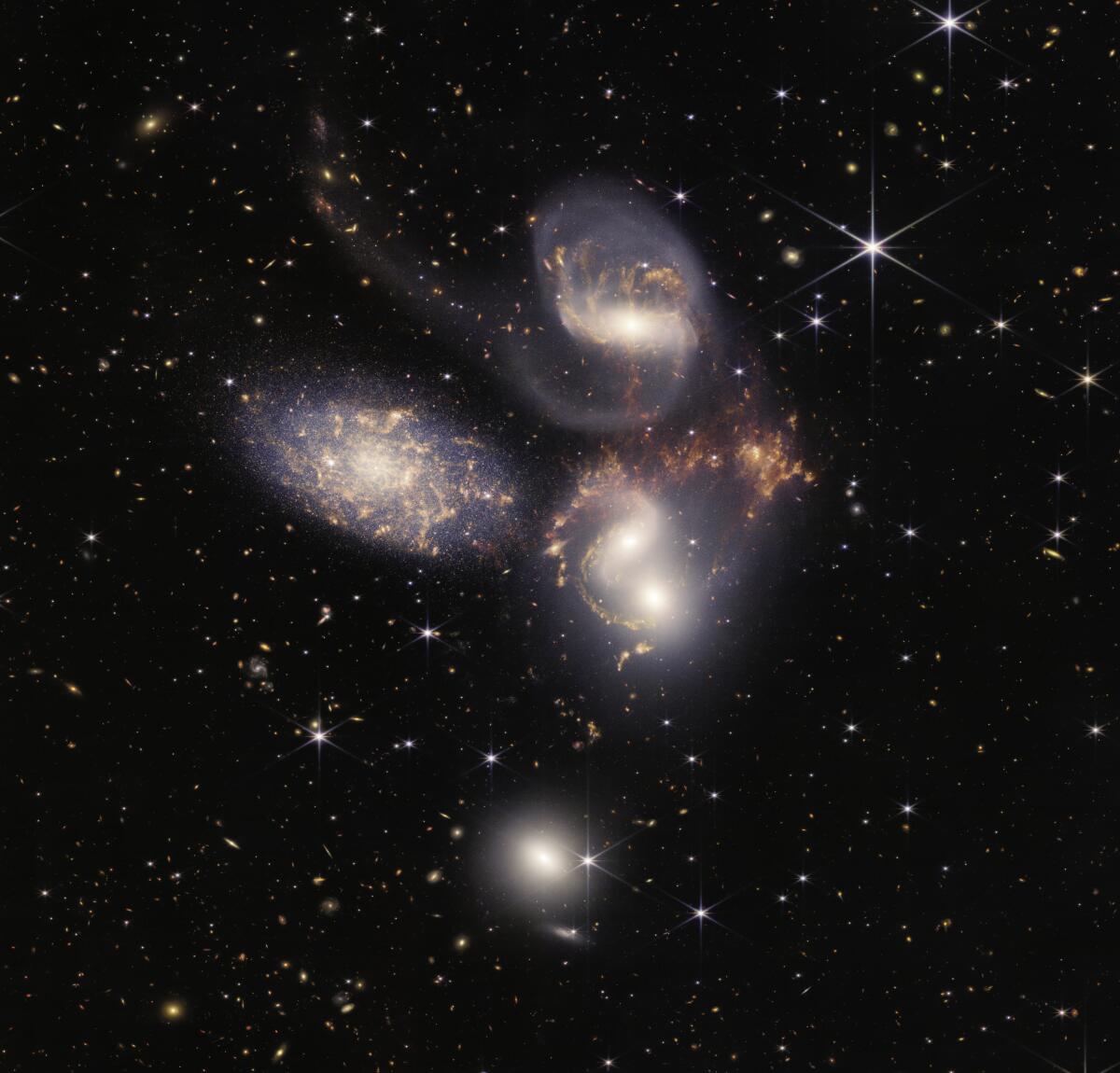 An enormous mosaic of Stephan's Quintet of galaxies, as pictured by NASA's James Webb Space Telescope.
