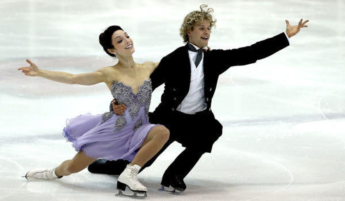 Meryl Davis and Charlie White, shown at the U.S. International Figure Skating Classic on Sept. 13, hope to become the first American couple to win Olympic gold in ice dancing.