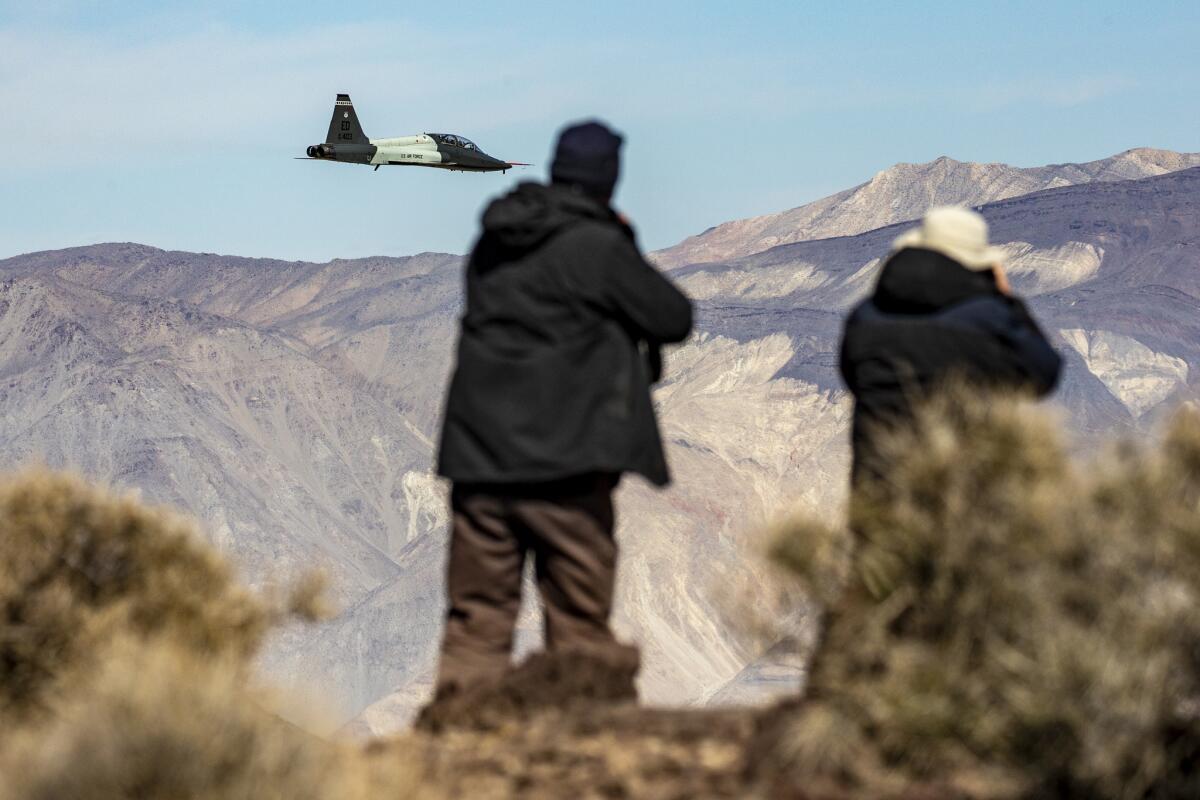DEATH VALLEY, CA, MARCH 18, 2019 --- A trainer T-38 Talon based at Edwards AFB, flies into Rainbow Canyon. United Air Force and Navy fighter jets train in Rainbow Canyon aka Star Wars Canyon, near the western edge of Death Valley National Park in Inyo County, California. The canyon accessed from Father Crowley Overlook off California State Route 190 gives visitors a place to witness and photograph jets flying beneath them. (Irfan Khan / Los Angeles Times)