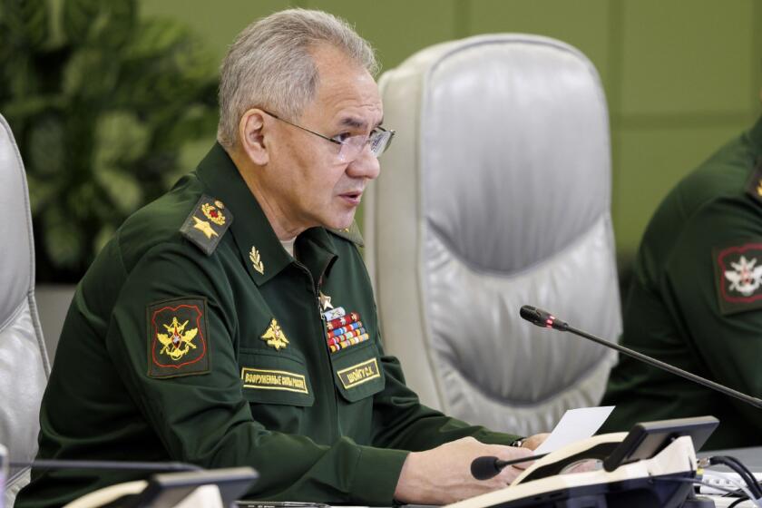 In this photo released by the Russian Defense Ministry Press Service on Tuesday, April 2, 2024, Russian Defense Minister Sergei Shoigu leads a meeting with the leadership of the Armed Forces at the National Defense Control Center in Moscow, Russia. (Russian Defense Ministry Press Service via AP)