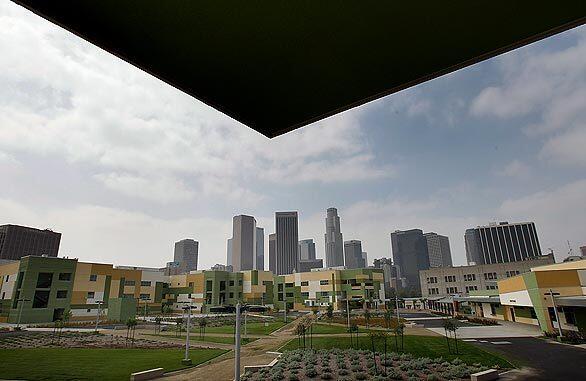 The downtown skyline rises behind Edward R. Roybal Learning Center as it is readied for its first semester - years after construction began on what was then called the Belmont Learning Complex, which became a symbol of dysfunction for the Los Angeles Unified School District.