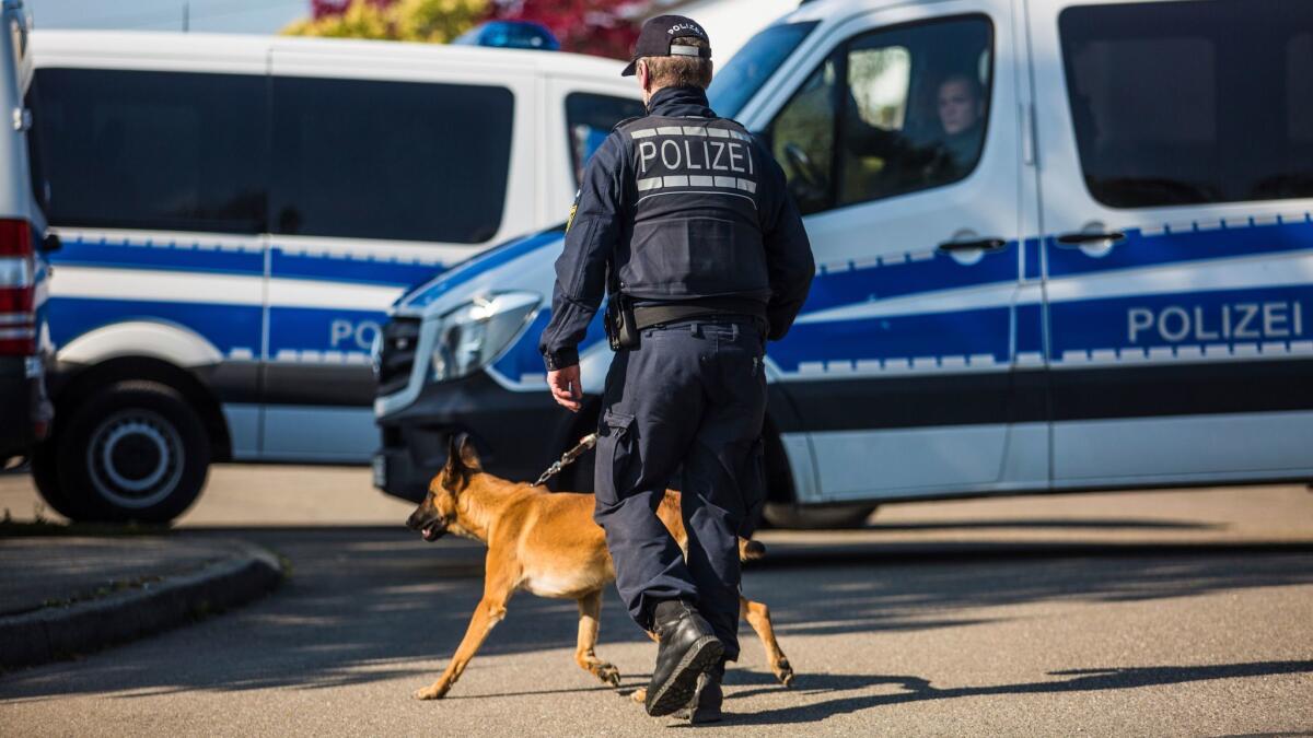 Police on Friday descended on a street in Rottenburg am Neckar, in southern Germany, where a suspect was arrested in connection with the explosives attack on the team bus of soccer team Borussia Dortmund.