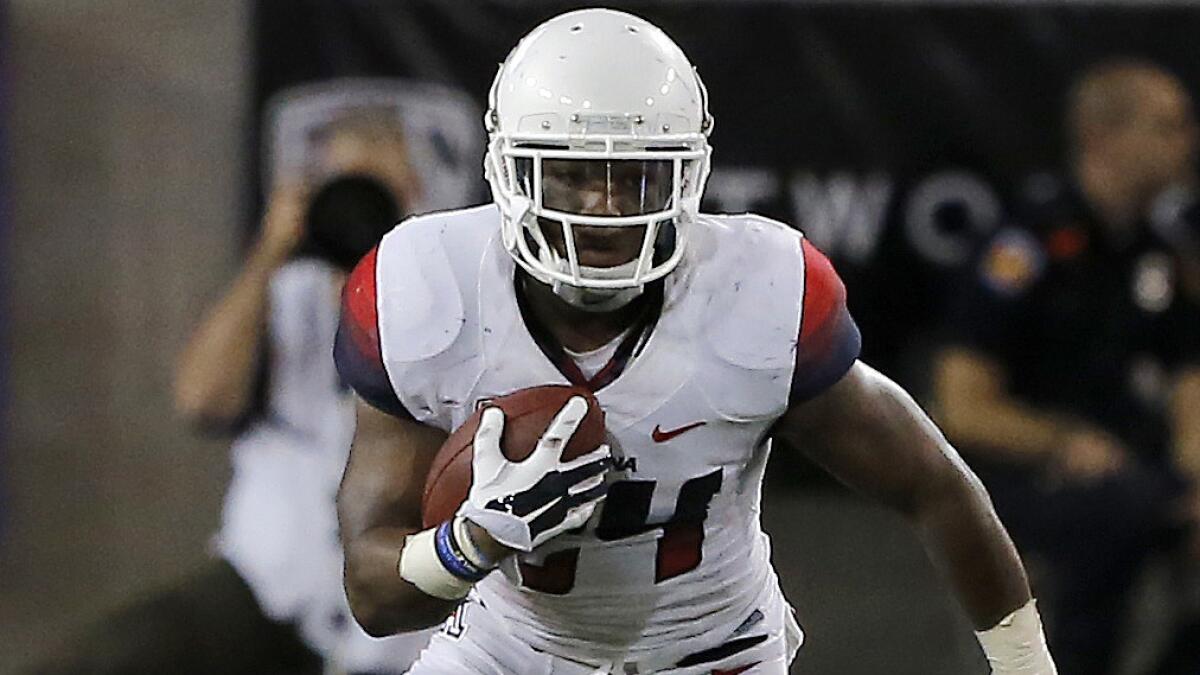 Arizona running back Terris Jones-Grigsby carries the ball during a win over California on Sept. 20.