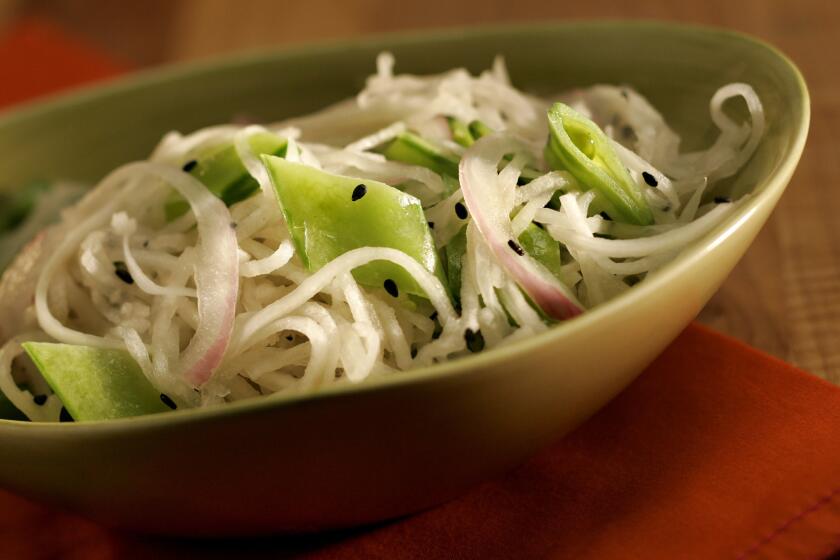 Combine the shredded radish with thinly sliced red onion and diced snow peas. Dress it with a rich but tangy sesame oil and rice vinegar dressing, and finish with black sesame seeds. Recipe: Daikon slaw