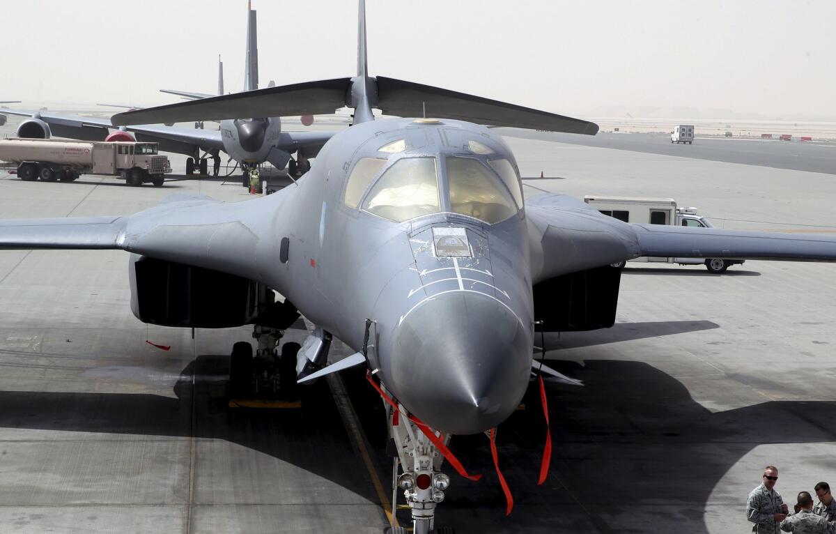 A B-1 bomber is seen at the al-Udeid Air Base in Doha, Qatar. The base is the regional nerve center for the air war against Islamic State militants.