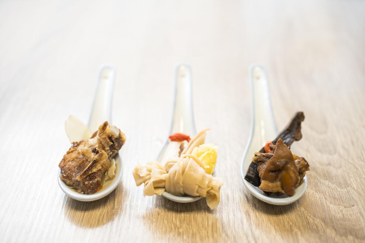 Three soup dishes at Nature Pagoda: Chuan pei with crocodile meat, hog's stomach with kingo nuts and reishi with chicken.