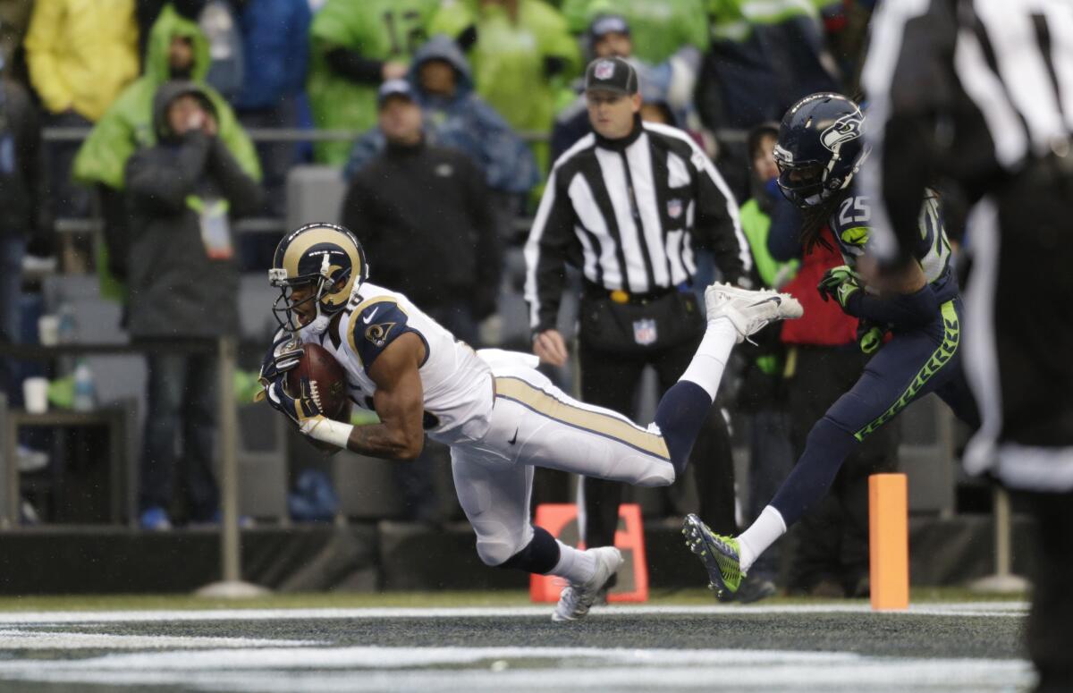 Receiver Kenny Britt dives into the end zone for a 28-yard touchdown reception against the Seahawks during a game on Dec. 27.