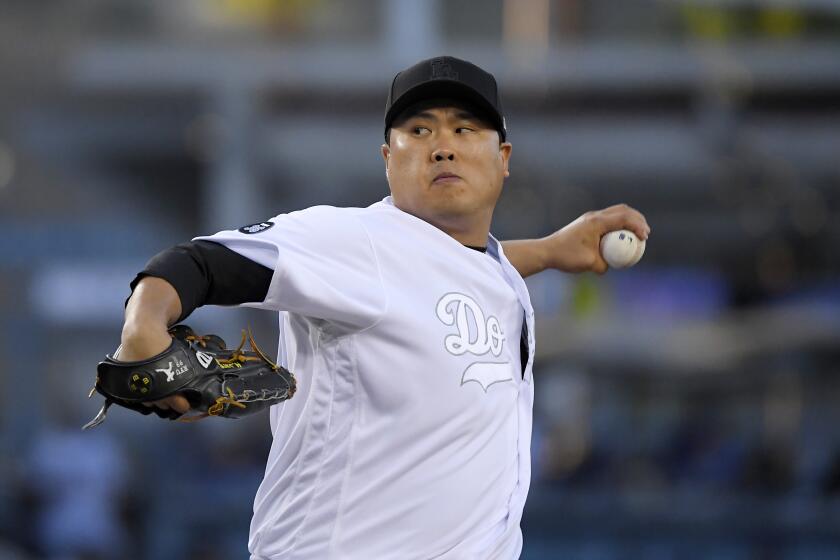 Los Angeles Dodgers starting pitcher Hyun-Jin Ryu, of South Korea, throws during the first inning of the team's baseball game against the New York Yankees on Friday, Aug. 23, 2019, in Los Angeles. (AP Photo/Mark J. Terrill)