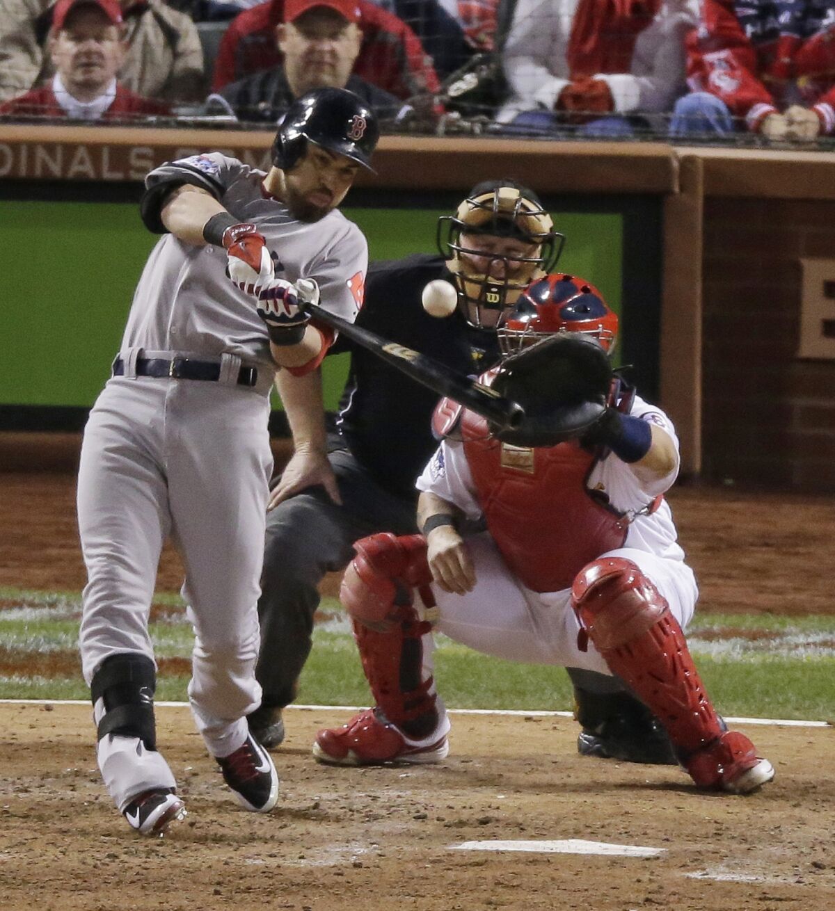 Boston's Jacoby Ellsbury hits a run-scoring single during the seventh inning of a 3-1 win over St. Louis in Game 5 of the World Series on Monday.